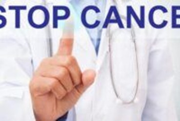 Doctor pointing upward beside the words 'Stop Cancer.'
