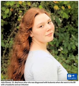Portrait of a teenage girl with long hair standing outdoors in front of greenery, taken in natural light.