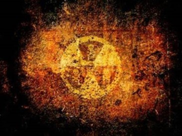 Radiation hazard symbol displayed on a textured background.