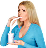 Woman using a breathing training device for controlled respiration.