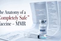 MMR vaccine vial and syringe displayed in front of a long vaccine prescribing information sheet.