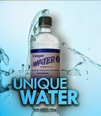 Bottle of Unique Water mineral water.